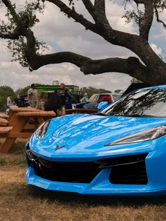 A bright blue modern Corvette on display at the Paradise Live car show