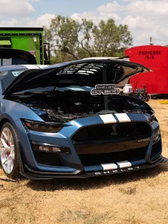 A blue Ford Shelby GT500 Mustang on display at Paradise Live